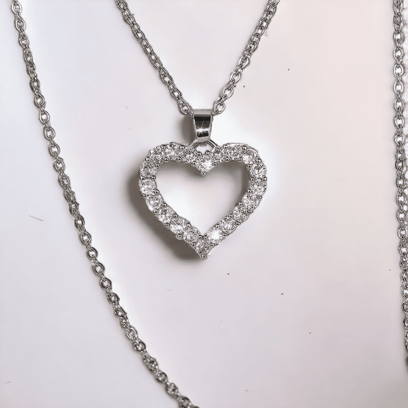 Silver heart pendant necklace with cubic zirconia diamonds  and a silver chain