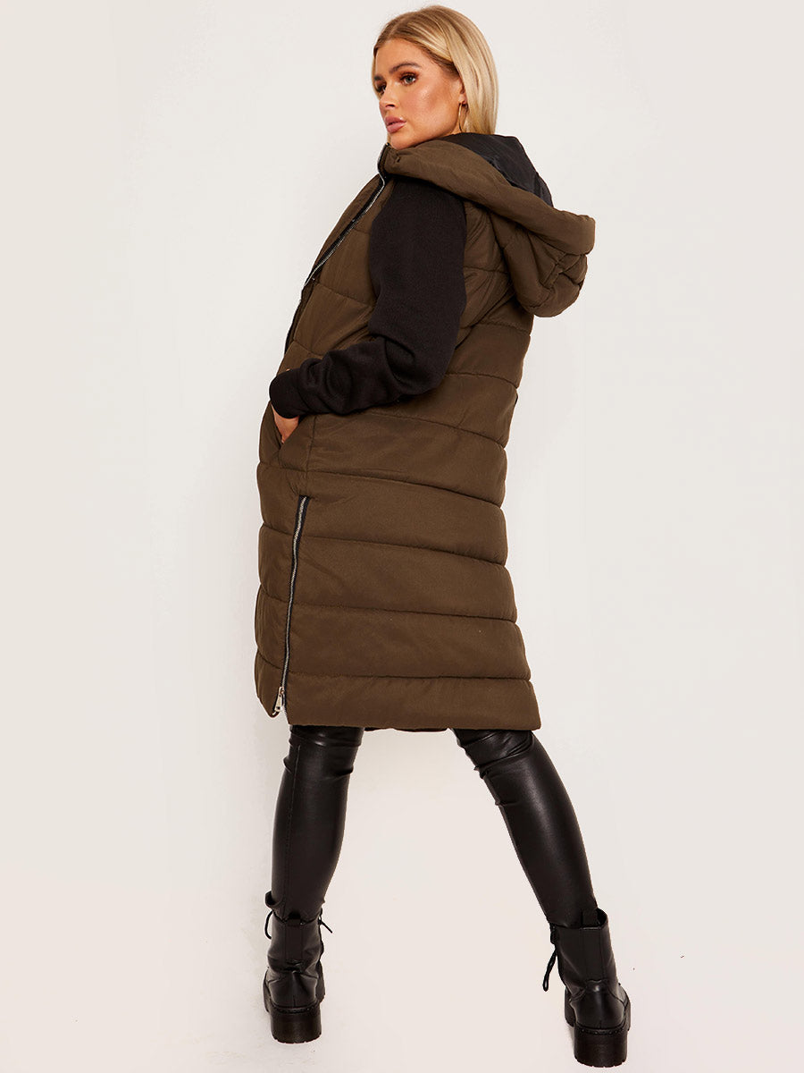 Women wearing a Longline Hooded Gilet with side pockets.