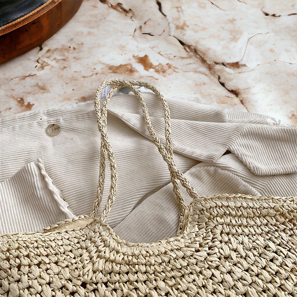 Handwoven straw handbag, Top zipper and internal lining pockets . Matching interior lining, Boho shoulder bag, Beach bag.