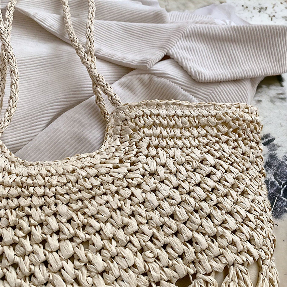 Handwoven straw handbag, Top zipper and internal lining pockets . Matching interior lining, Boho shoulder bag, Beach bag.